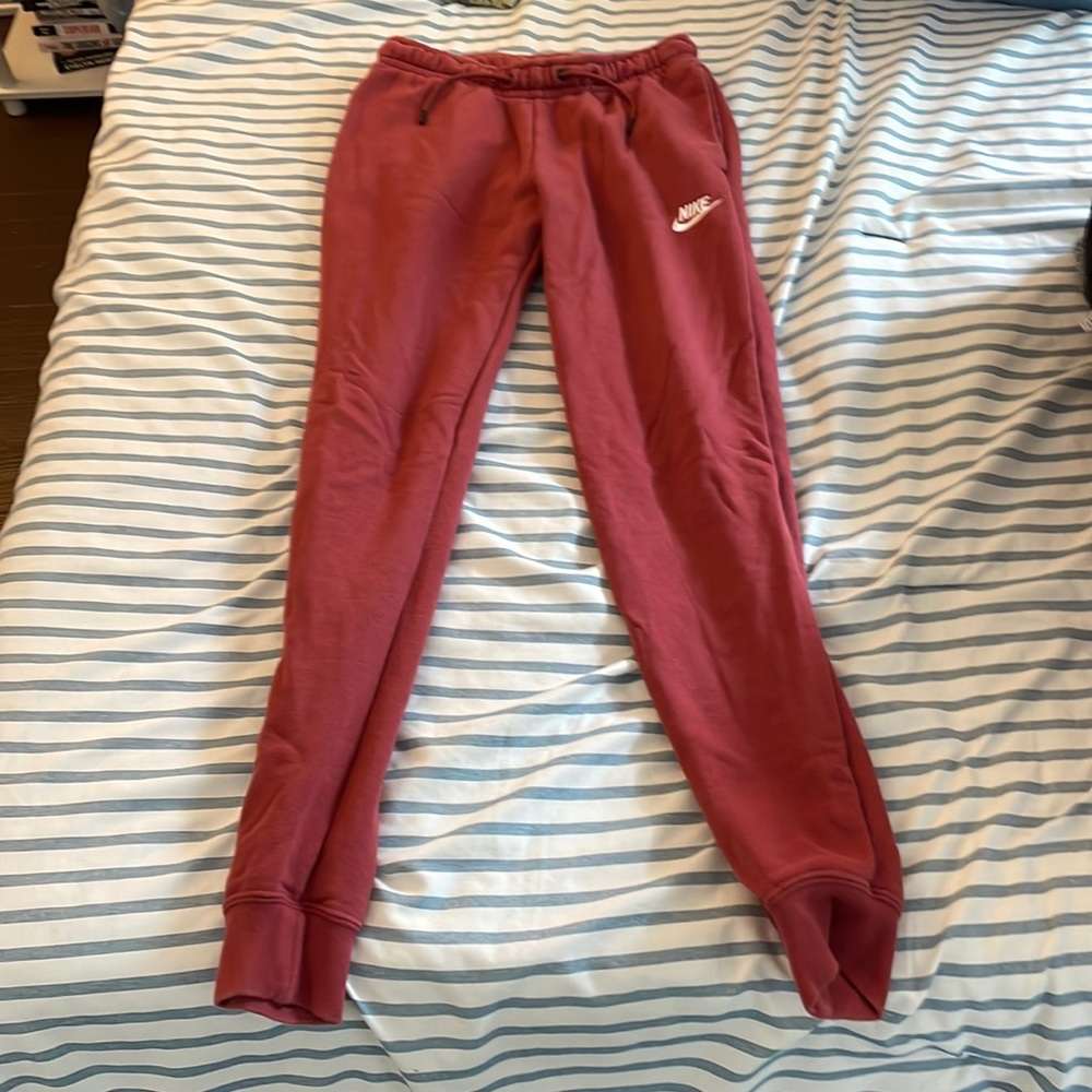 Nike sweatpants. Size XS. Dark pink color. Great condition